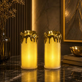 White and Yellow LED flameless votive candles with dripping gold design