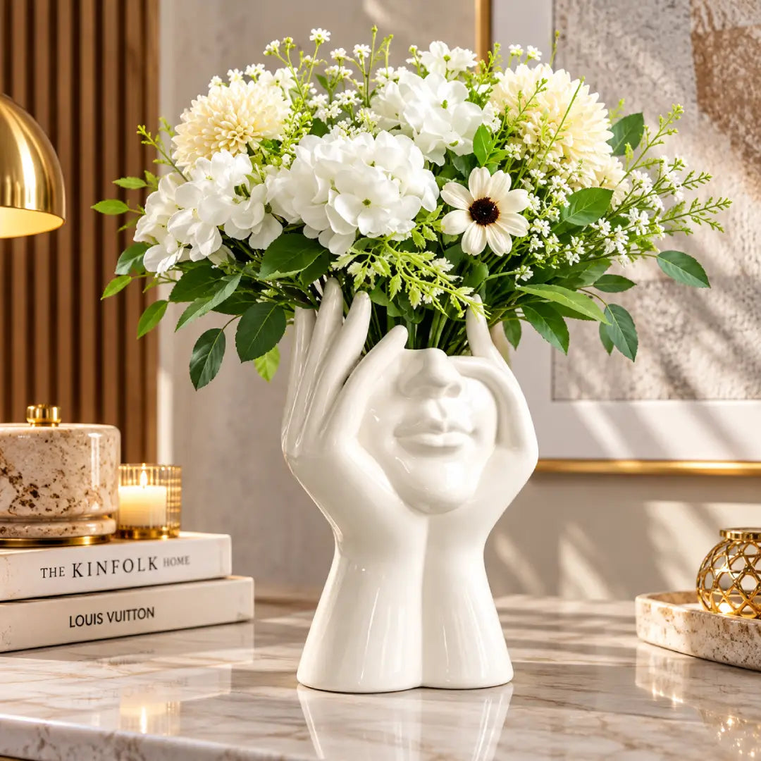 Modern face and hand sculpture flower planter