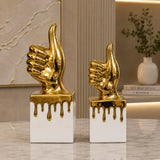White thumbs-up hand gesture sculpture for modern home decor