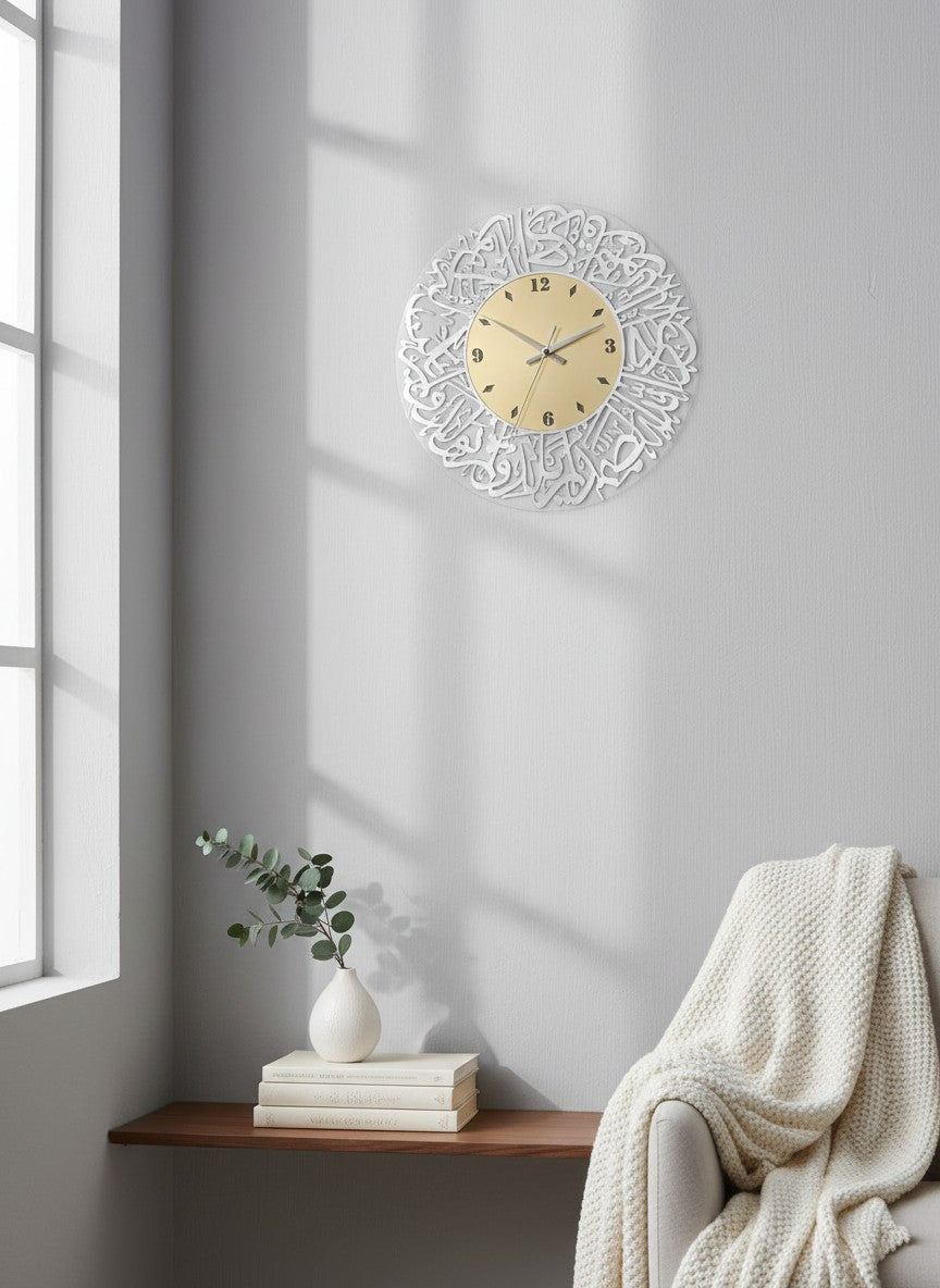 Decorative wall clock on a gray wall with a window and books in the background